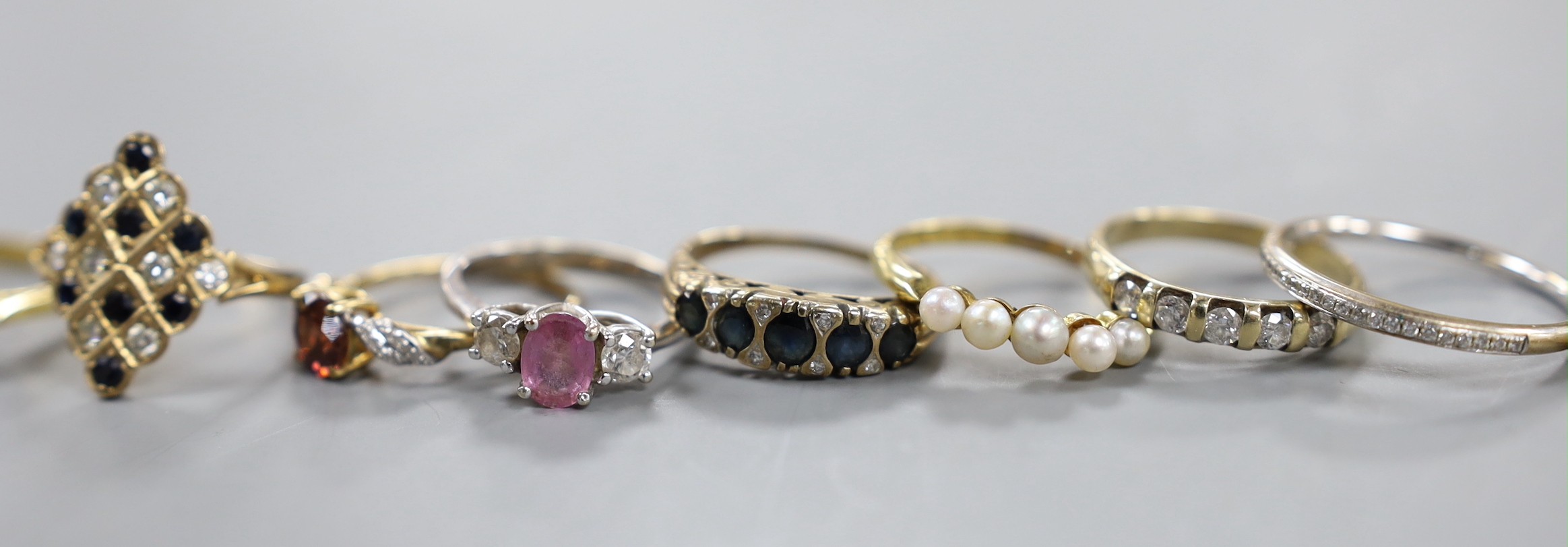 A modern platinum and solitaire diamond set ring, size G, gross weight 1.4 grams, four assorted 18ct gold and gem set rings including diamond chip half eternity and a pair of Italian 750 and cultured pearl earrings, gros